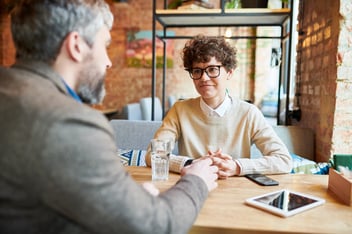 Insurance provider talking to client or employee