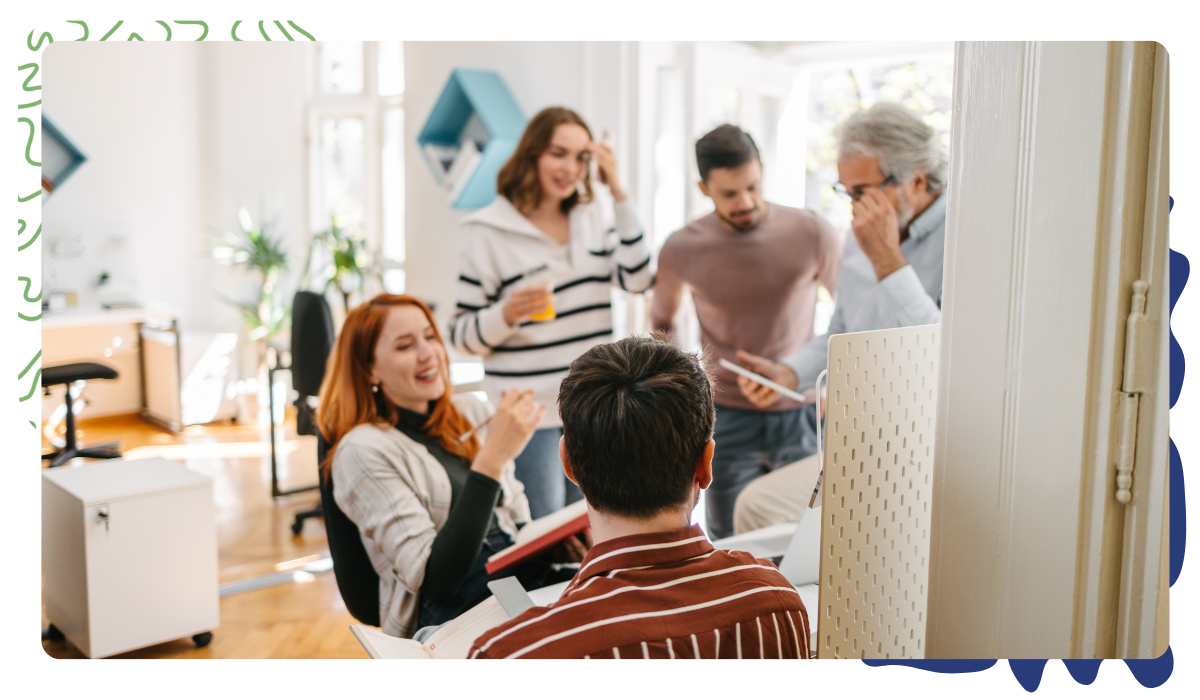 Smiling team working together in a bright office Smiling team working together in a bright office